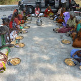 Serving of special food chicken briyani during welfare needs distribution camp